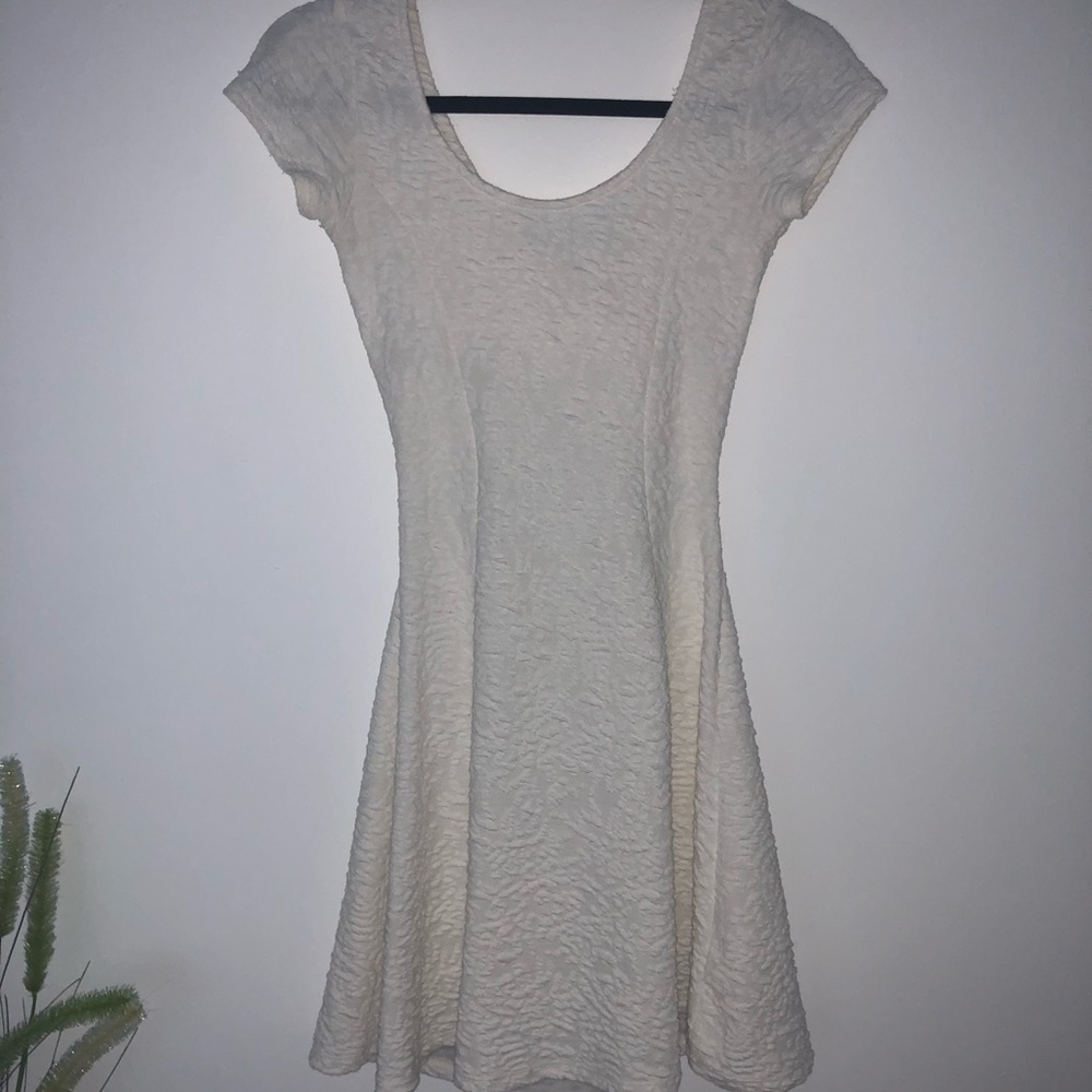 Semi open backed “ skater “ styler dress